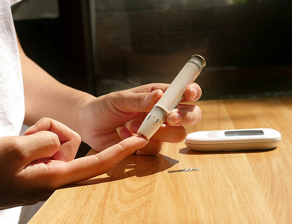 the writer pricks her finger so she can test her blood sugar.