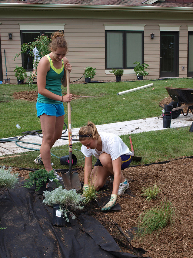 Rachel and her friend, Sammy, working on their Gold Award Project. The Serenity Garden at the Maria Kelting Steiner Hospice Home