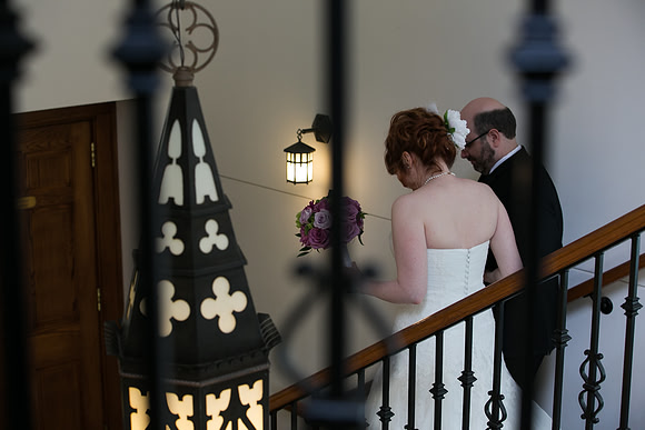 A-couple-walking-down-a-staircase-at-The-Minneapolis-Club.jpg