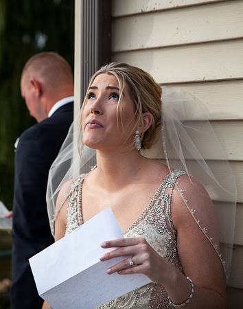 An-Emotional-bride-reading-a letter-MN-Bride.jpg