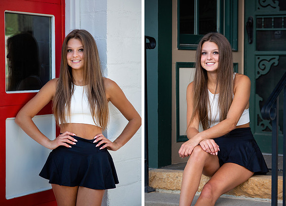 A young woman with glowing brown hair and dimples poses in her Senior Portraits in Downtown Carver
